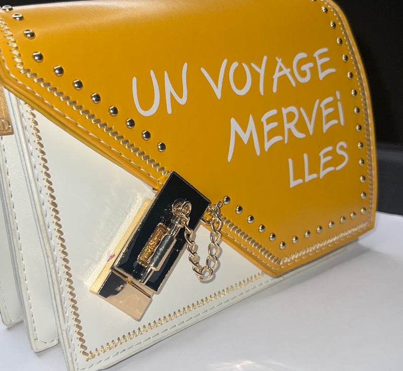 UN VOYAGE MERVEILLES - A TRIP TO WONDERLAND HANDBAG