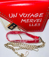 UN VOYAGE MERVEILLES - A TRIP TO WONDERLAND HANDBAG